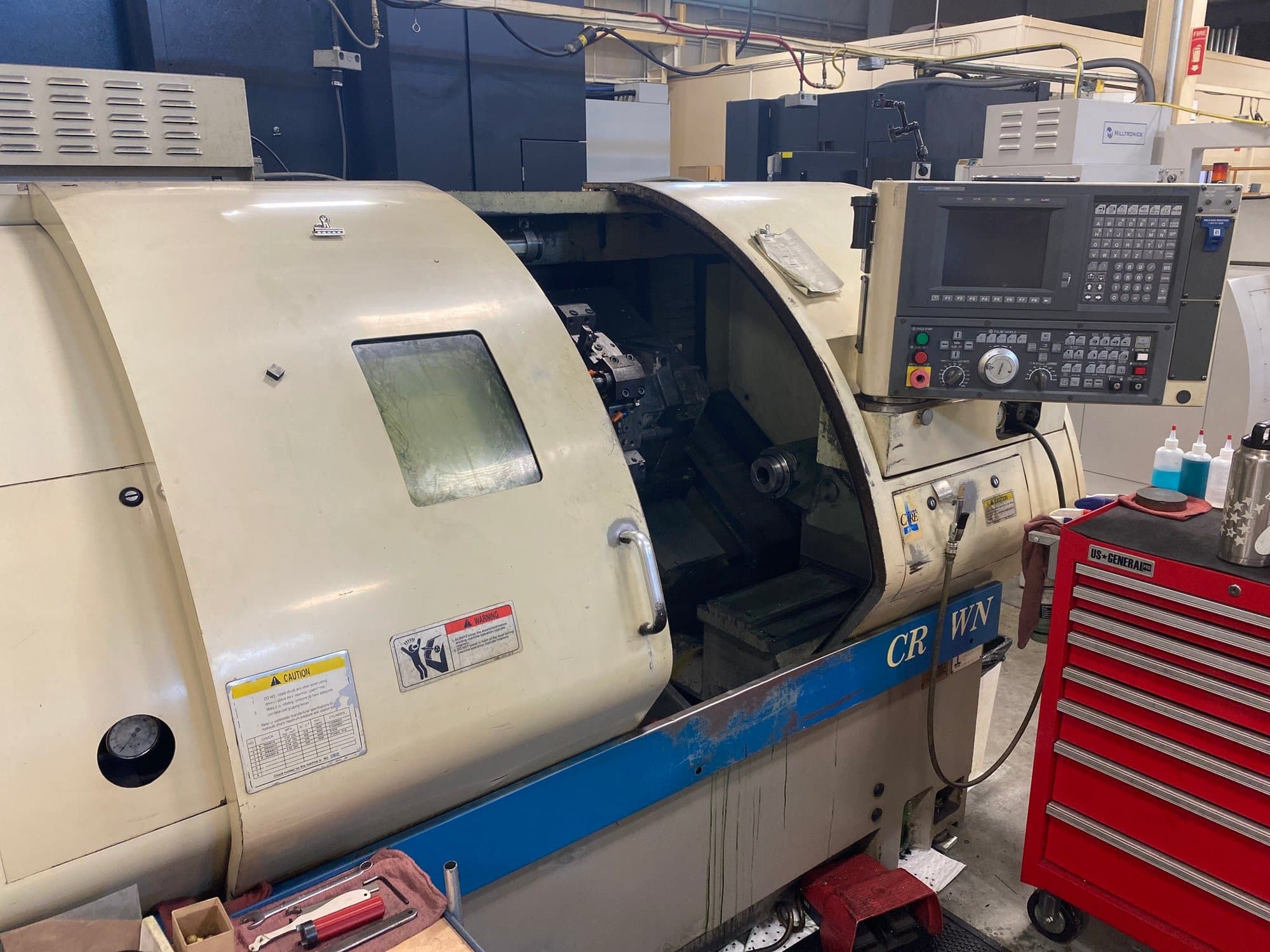 Okuma Crown 762E CNC Lathe, 1997 - w/OSP700L Control, 8