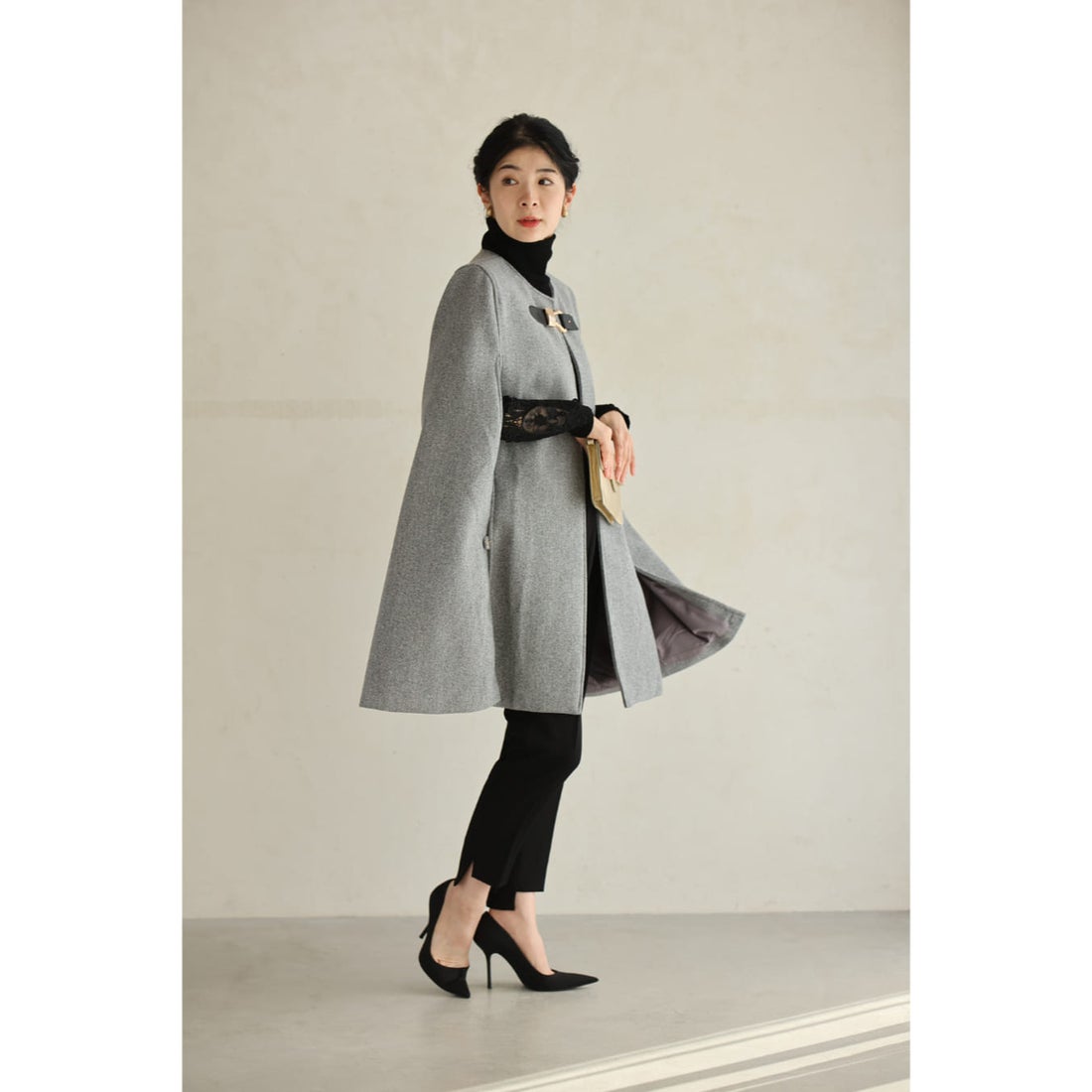 カワイイ CAWAII ゆったり身体を包み込むフロントベルトのポンチョ