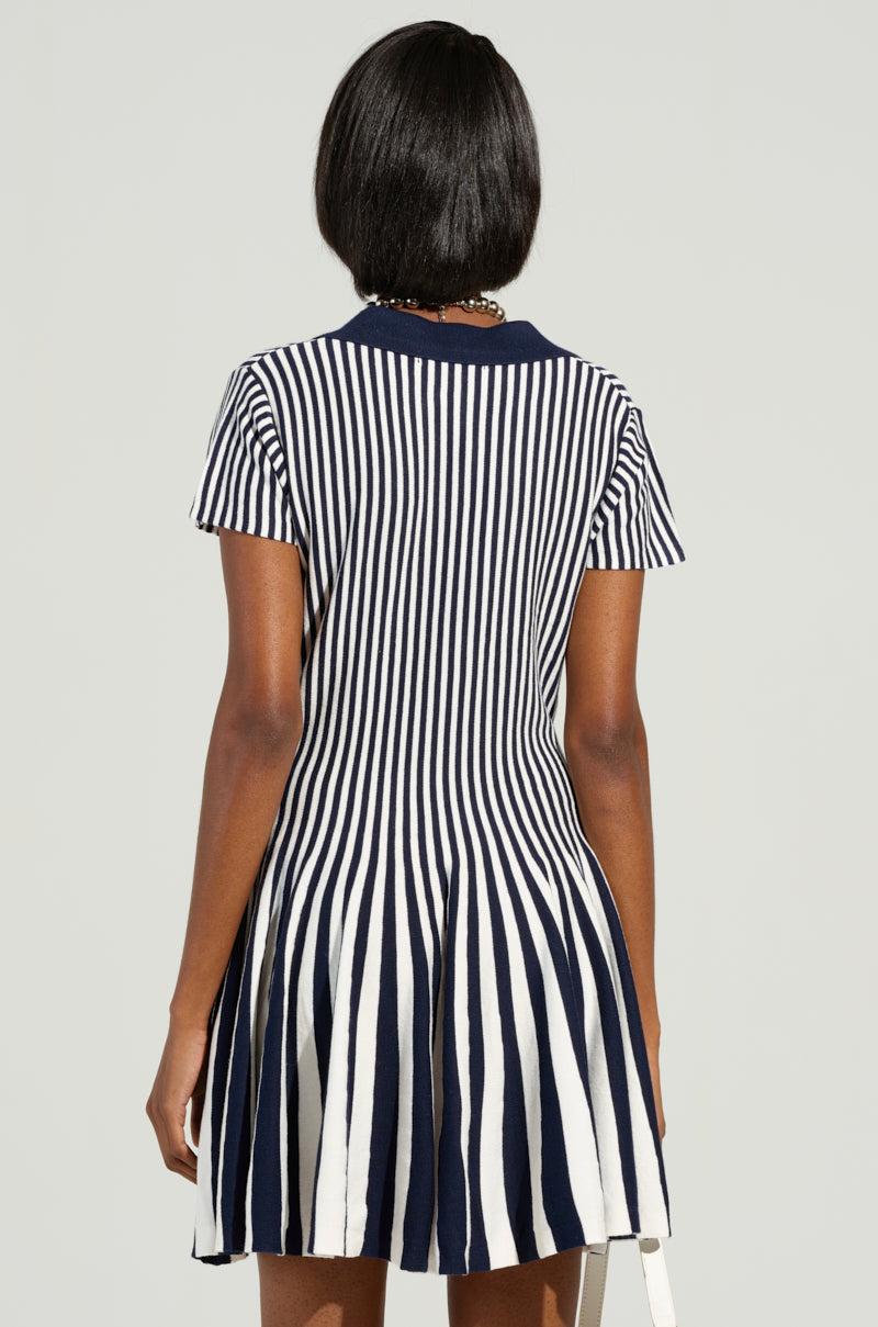 ALINA PLEATED KNIT FIT AND FLARE MINI DRESS IN NAVY – AKIRA