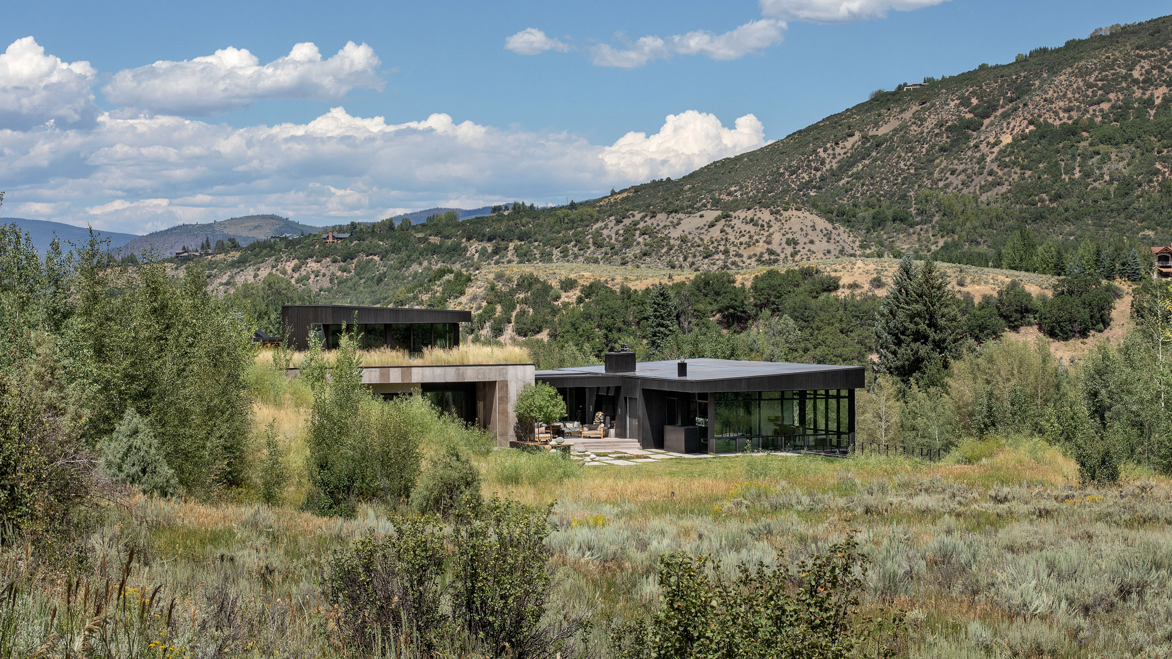 CCY Architects nestles Aspen home into mountainous hillside