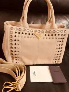 2026年最新】prada カナパ ベージュの人気アイテム - メルカリ