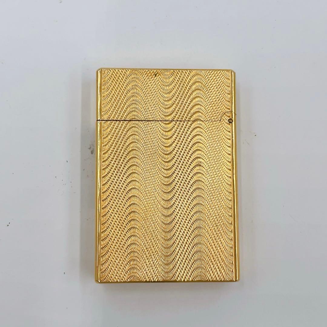 12AB038 S.T.DUPONT ライター 金色 ライン2 火花OK 波模様