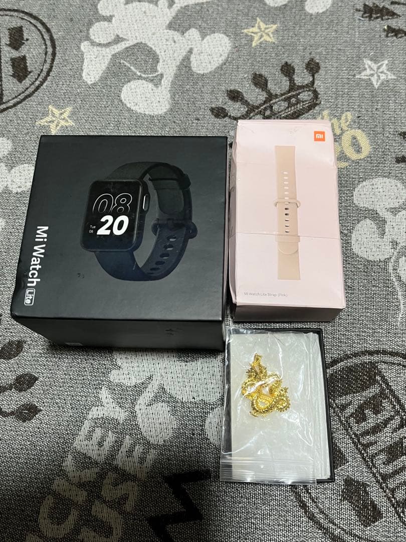 18 K ドラゴンペンダント (1 gram) とxiomi watch 新品」18金 龍 ドラゴン ダイヤモンド付 ペンダント K18WG 丸型
