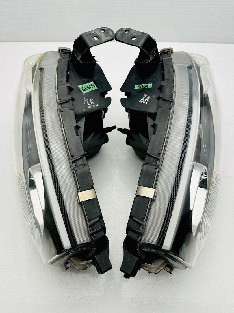 日産 キューブ ヘッドライト ヘッドランプ ハロゲン STANLEY P8190