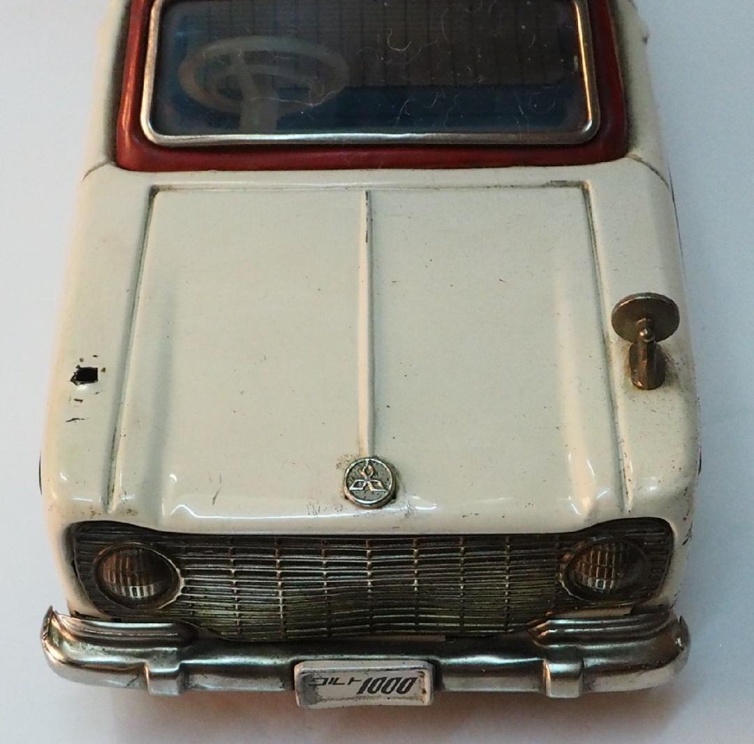 萬代屋【三菱コルト 1000 赤白 ミラー欠】フリクション ブリキTIN【箱無】