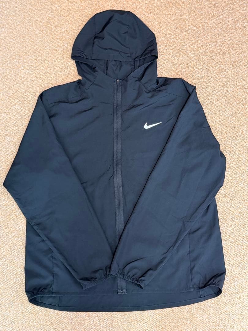 Nike 黒 フード付きナイロンジャケット - メルカリ
