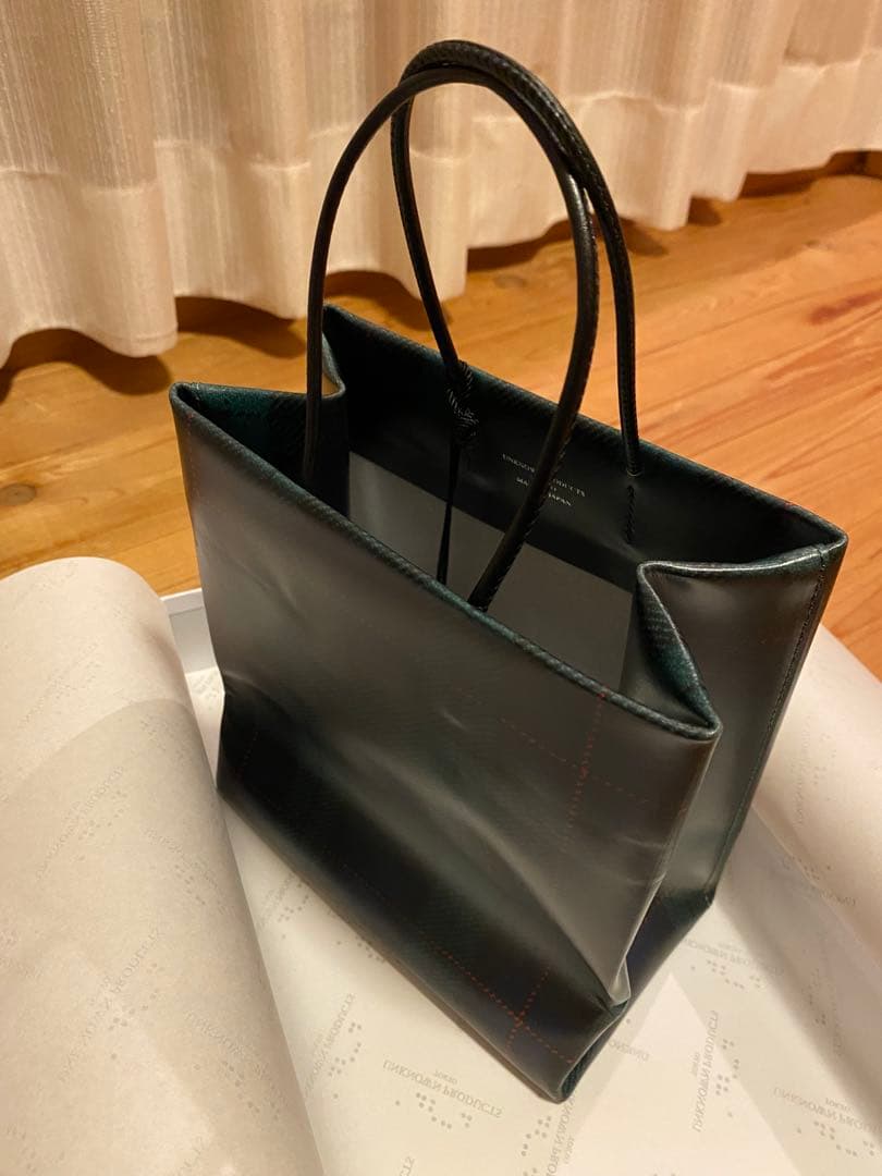 アンノウンプロダクツ 伊勢丹限定 レザーペーパーバッグ ブラック