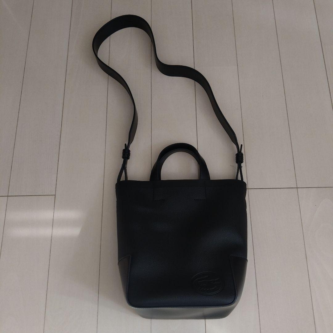 LACOSTE ブラック ショルダーバッグ - メルカリ