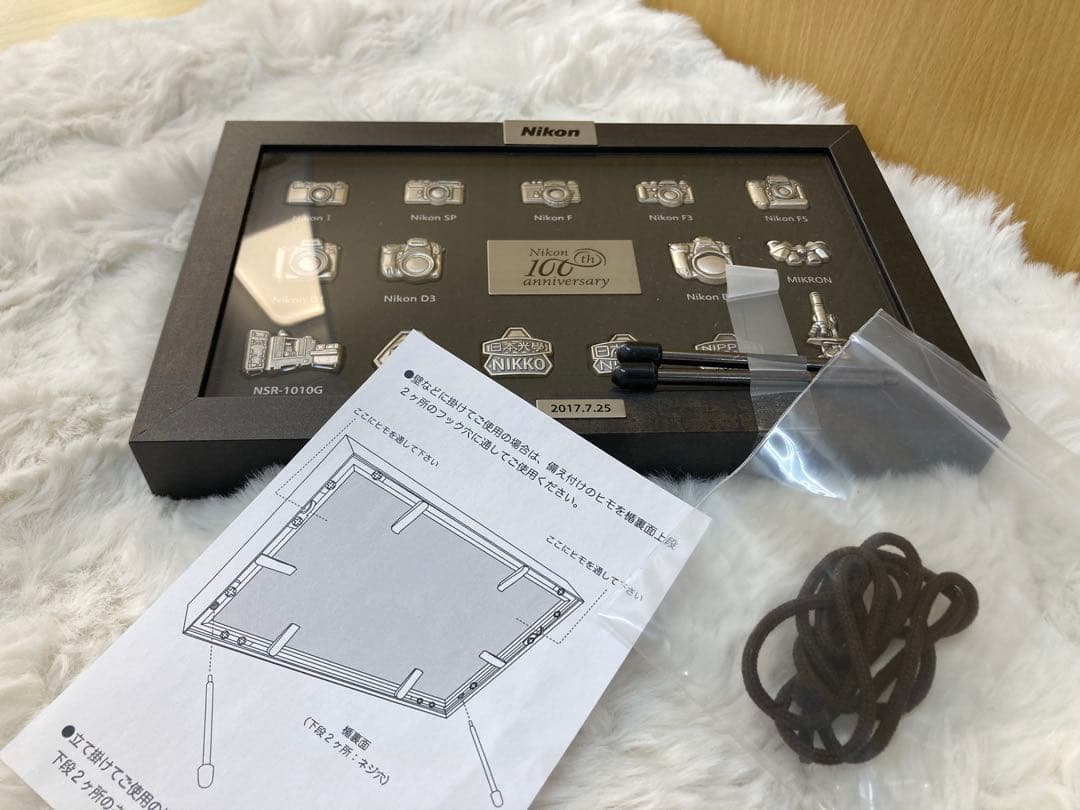 非売品】Nikon 100th anniversary 歴代カメラピンバッジ - メルカリ