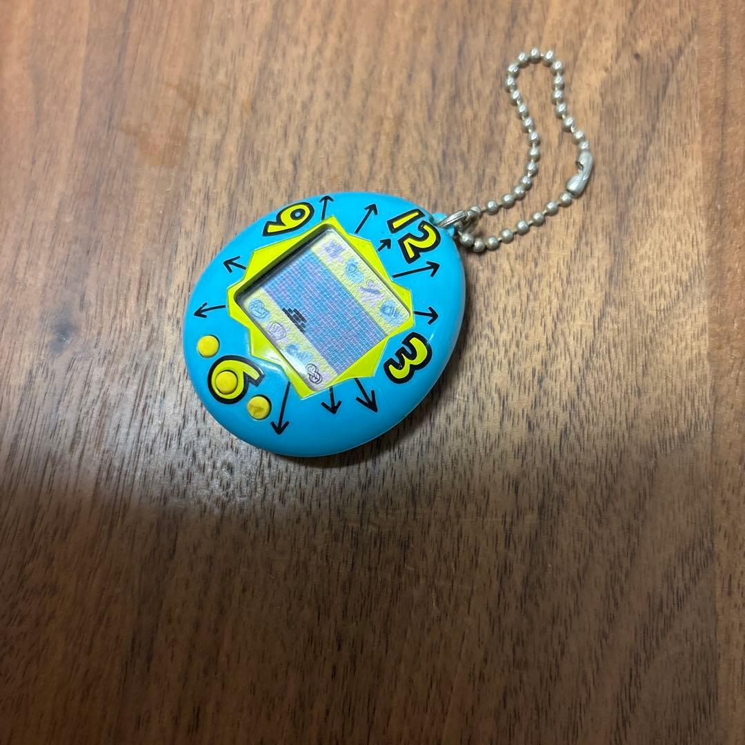 たまごっち 初代 時計柄 青緑色 海外版 青色 水色 黄色 その50 - メルカリ