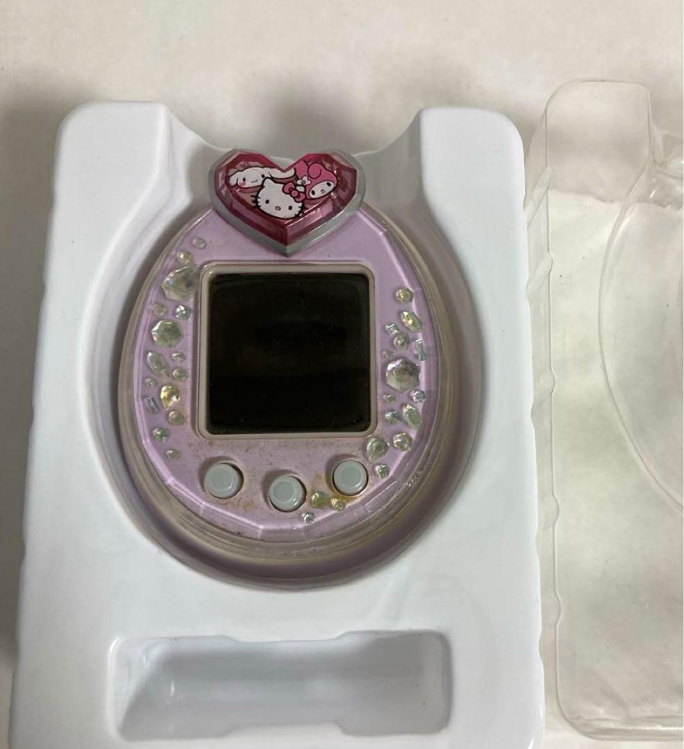 箱、説明書付】たまごっち ピース パープル たまデコピアス サンリオ