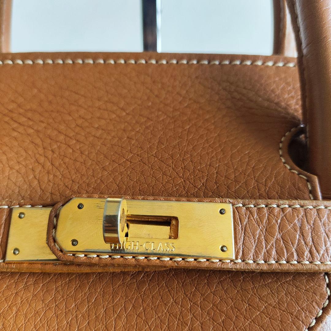 美品 HIGH CLASS ハンドバッグ トートバッグ 35 シボ革 鍵なし - メルカリ