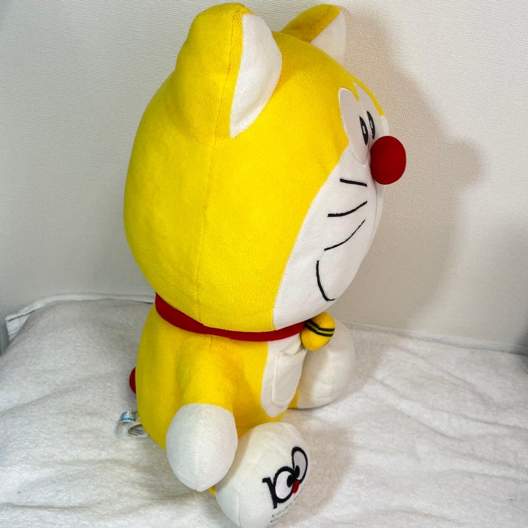 希少】生誕100年前ぬいぐるみ 黄色 ドラえもん - メルカリ