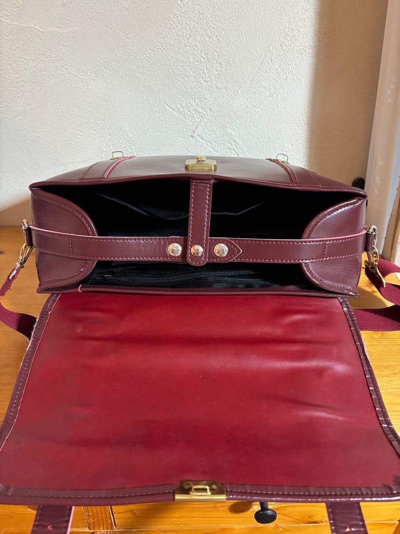 就実高校 通学バッグ エンジ - メルカリ