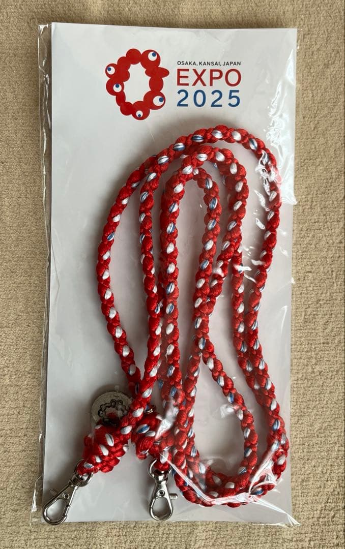 EXPO2025 公式ロゴ 組紐ショルダーストラップ EXPO2025 公式ロゴ 組紐ストラップ ミャクミャク - メルカリ