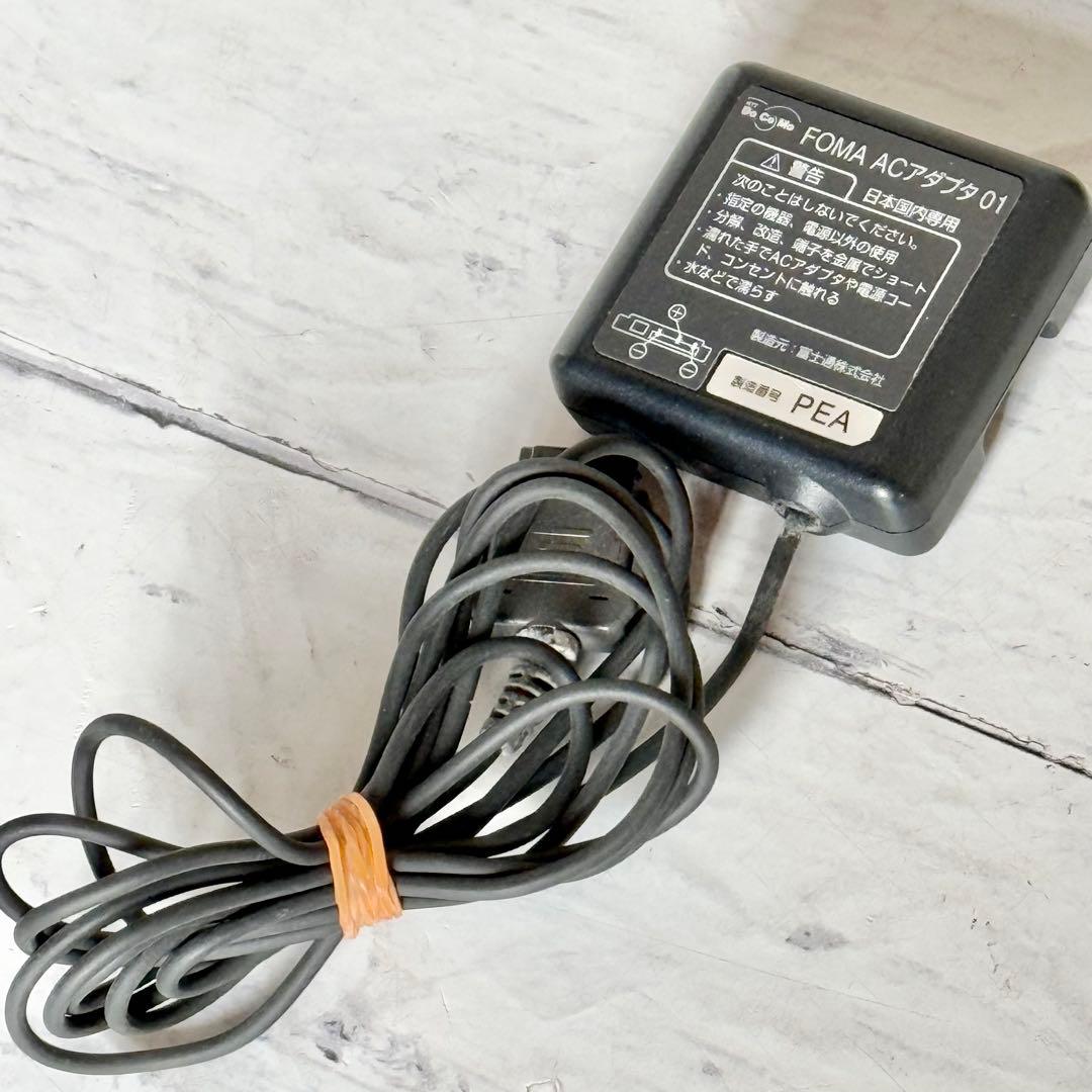 docomo arrows F-03L用充電ホルダー、アダプターセット - メルカリ