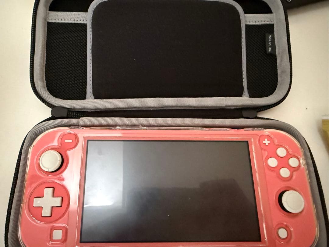 Nintendo Switch Lite コーラル 本体とケース ピンク 任天堂（Nintendo） Nintendo Switch Lite コーラル スイッチライト