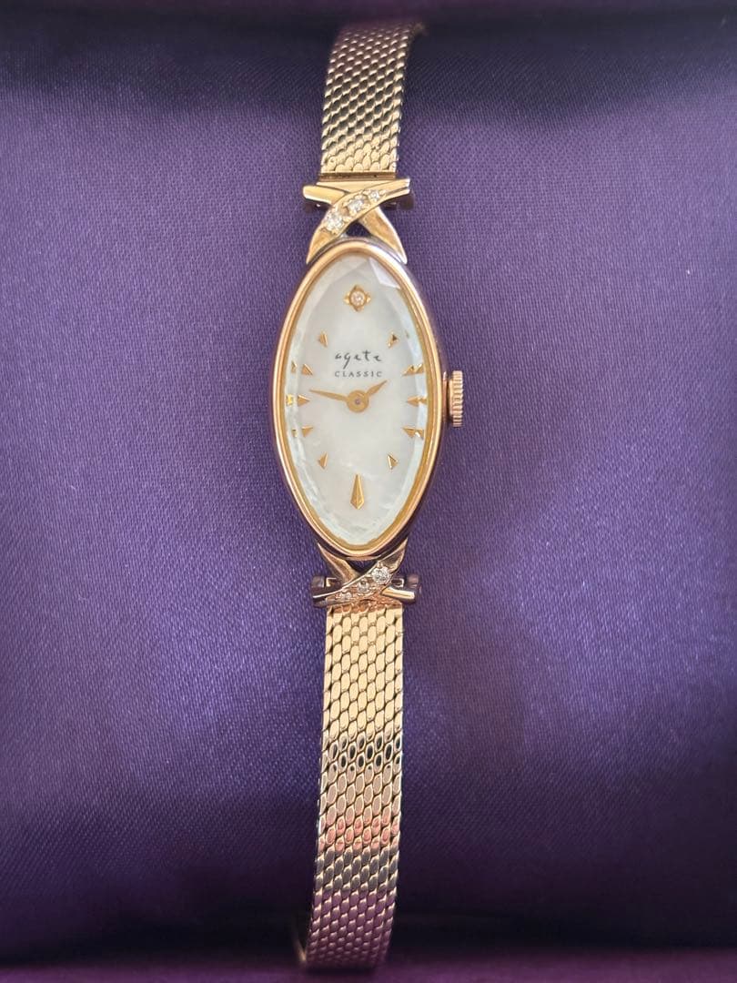 agete アガット オーバルフェイス ジュエリーウォッチ ダイヤ シェル