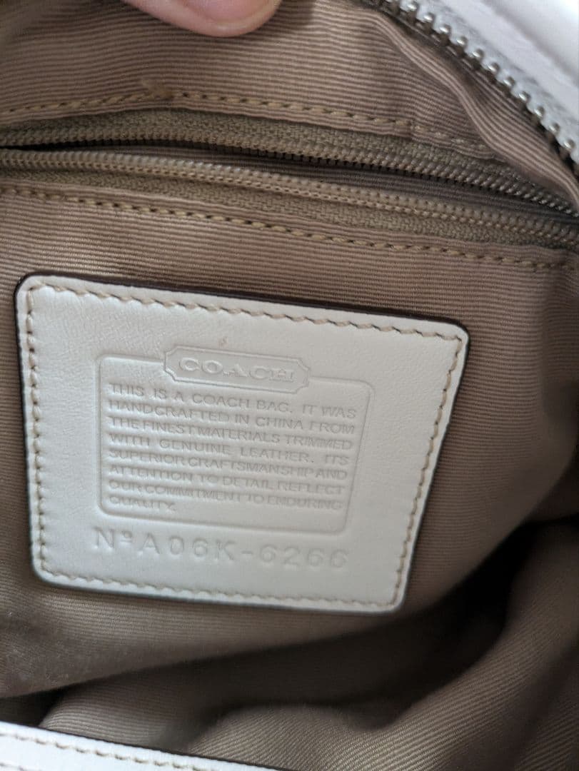 コーチcoach茶色シグネチャー模様キャンバス 半円形スモールホーボー