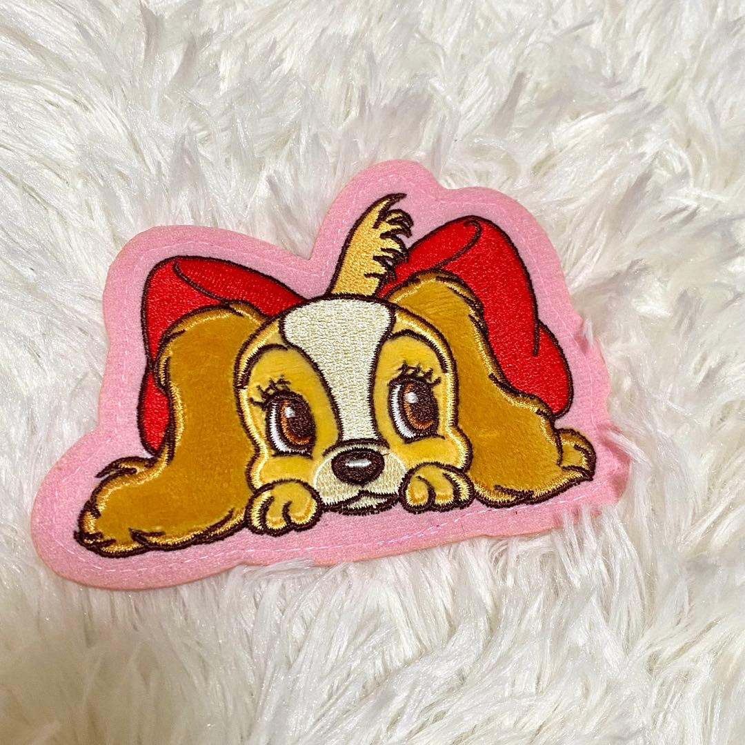 ディズニーストア わんわん物語 レディ ワッペンバッジ - メルカリ