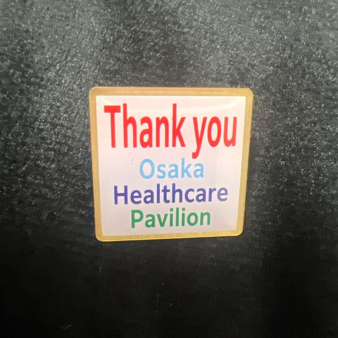 大阪ヘルスケアパビリオン ピンバッジ - メルカリ