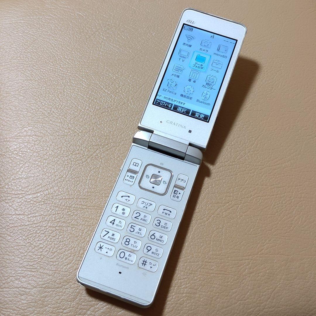 au 京セラ gratina KYY06 ガラケー 携帯電話 KYOCERA - メルカリ