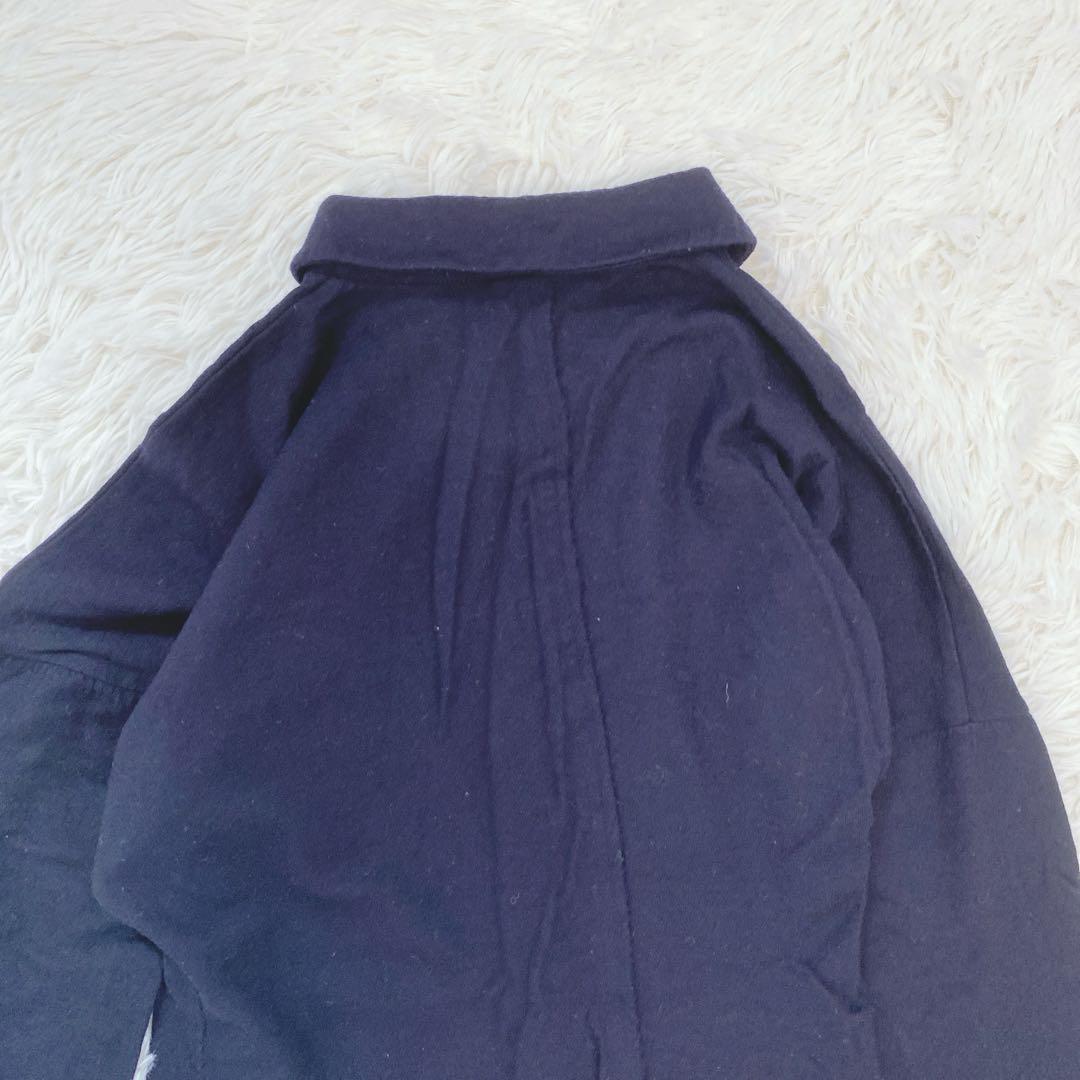 コムデギャルソン エンボスデザイン ラウンドカラー ウール ブラウス