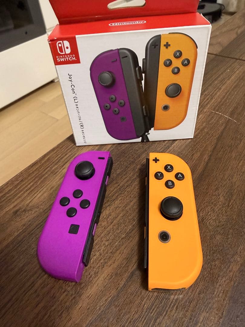 Nintendo Switch ジョイコンパープルイエローストラップ付き - メルカリ