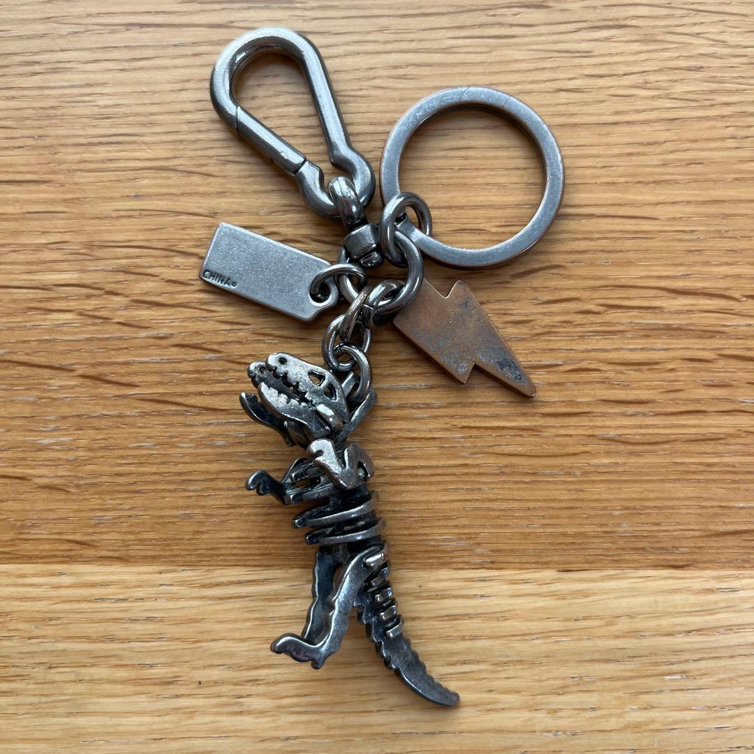 COACH コーチ チャーム レキシー ティーレックス 恐竜 - メルカリ