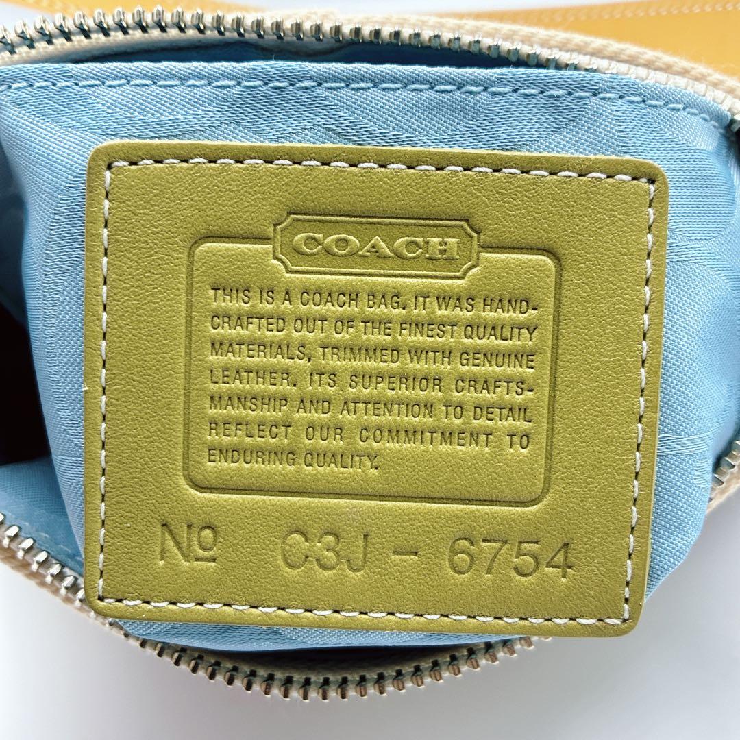 希少⭐️COACH コーチ アクセサリーポーチ 渋谷限定 フラワー