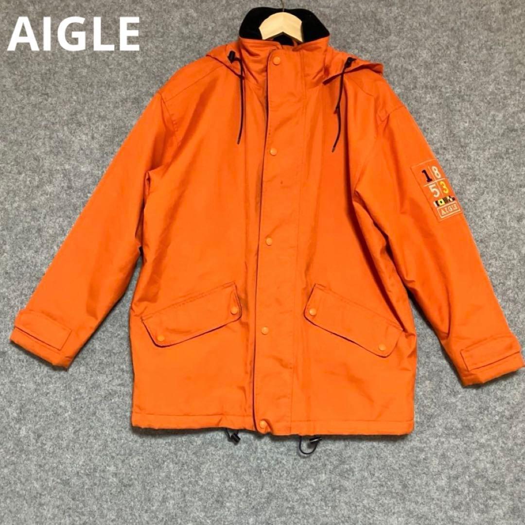 AIGLEオレンジ フード付きナイロンジャケット - メルカリ