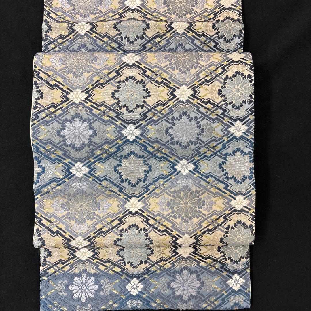 新品特選京都帯の名門細尾取扱い西陣藍染横段ボカシ袋帯（色留袖、訪問着、色無地） 桝屋高尾】 特選西陣織両面袋帯 ≪全通・ねん金綴錦≫ 「段霞文・金茶