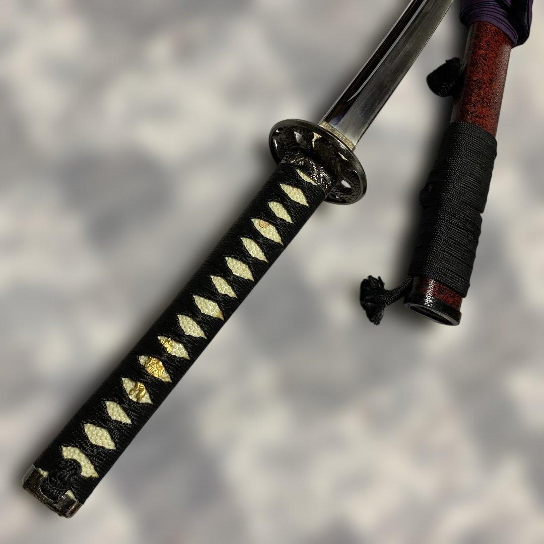 豪華模造刀(刀袋付) 坂本龍馬拵え 黒柄 龍彫透し丸鍔 - メルカリ