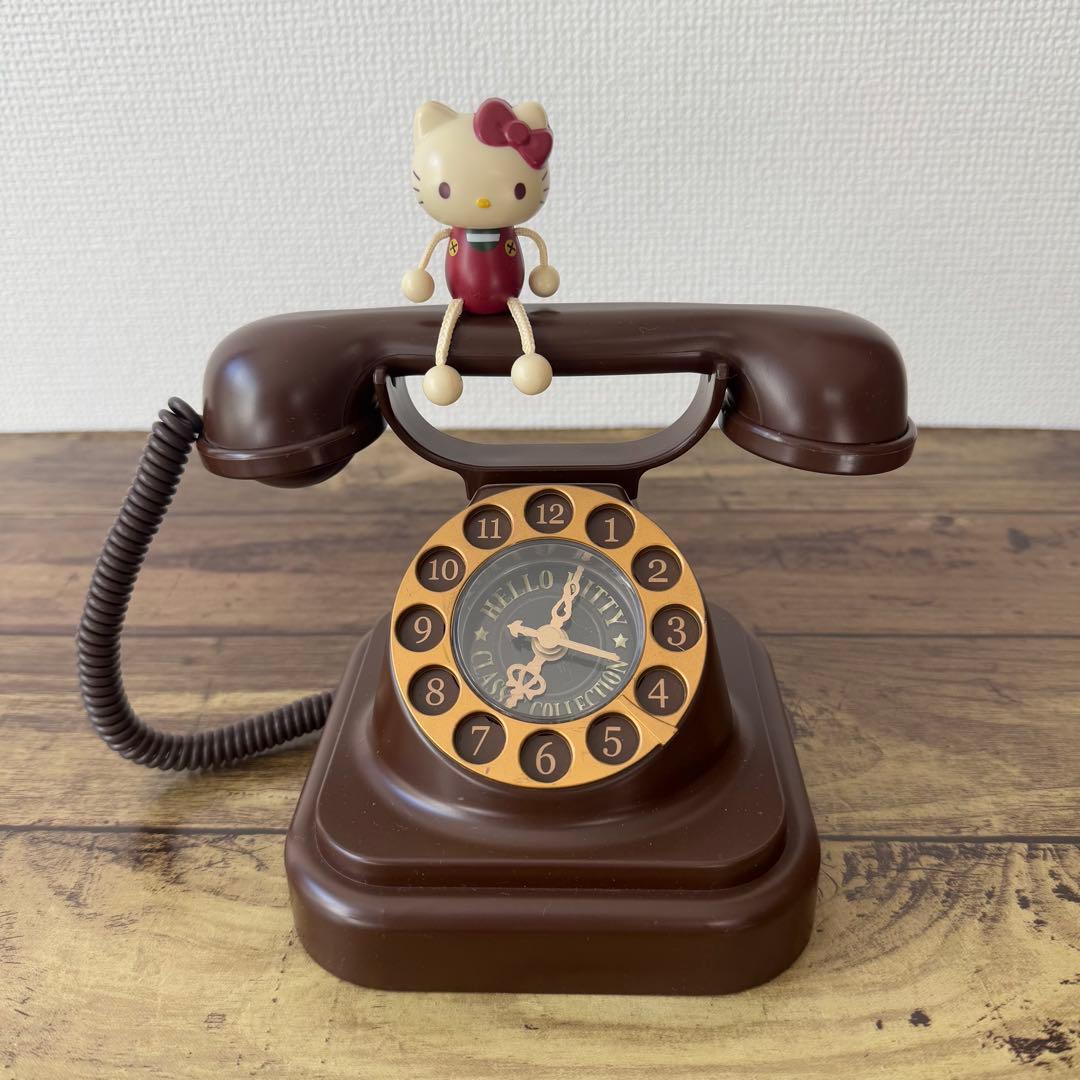 ハローキティ 黒電話 レトロ 電話型クロック 時計 - メルカリ