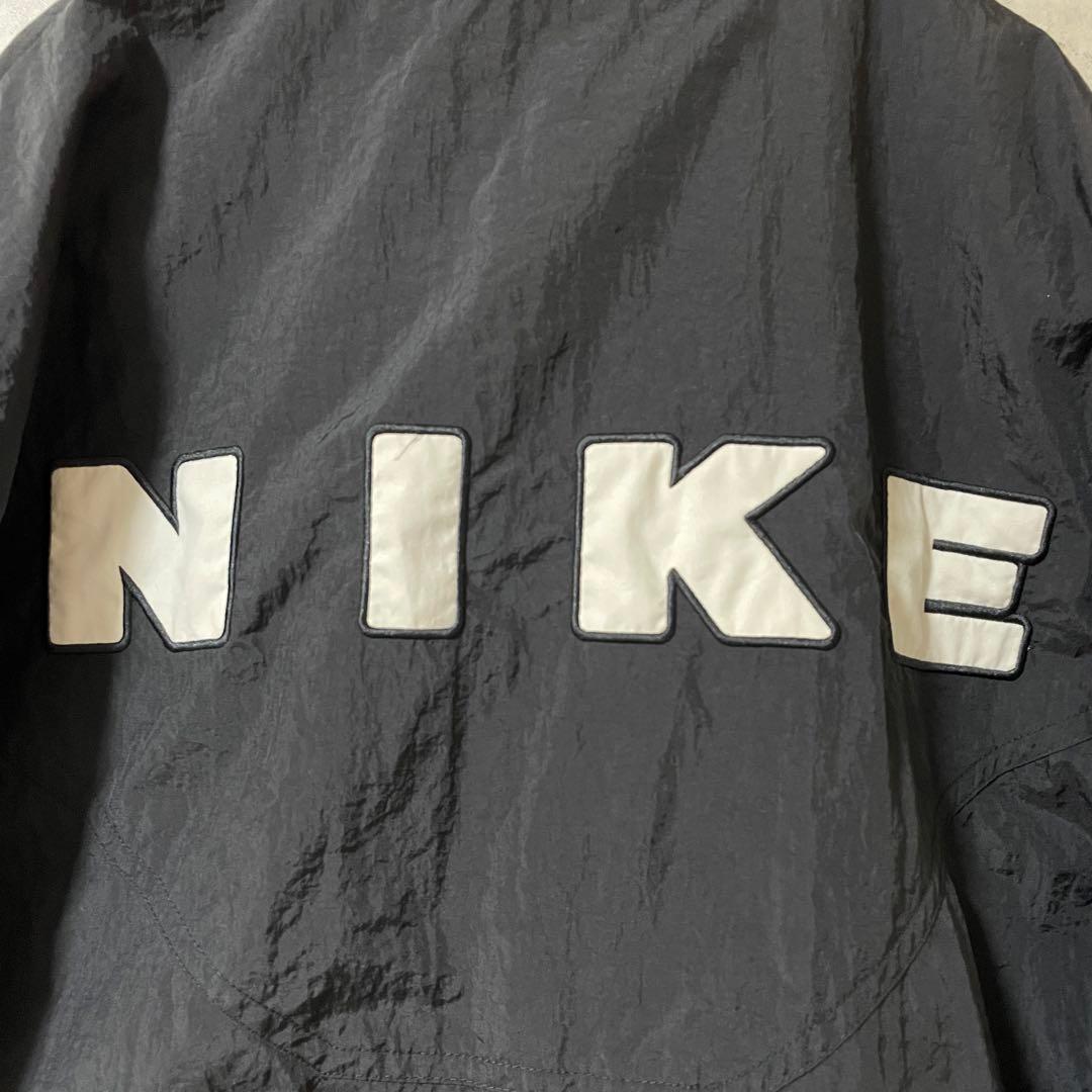 NIKEナイキナイロントラックジャケットハーフジップ黒ブラック刺繍ロゴ