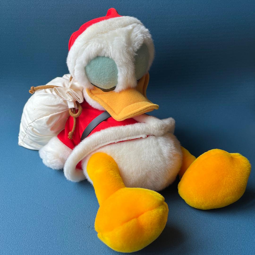 ディズニードナルドダックぬいぐるみ（サンタコスチューム） - メルカリ
