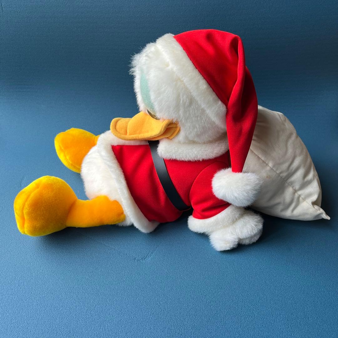 ディズニードナルドダックぬいぐるみ（サンタコスチューム） - メルカリ