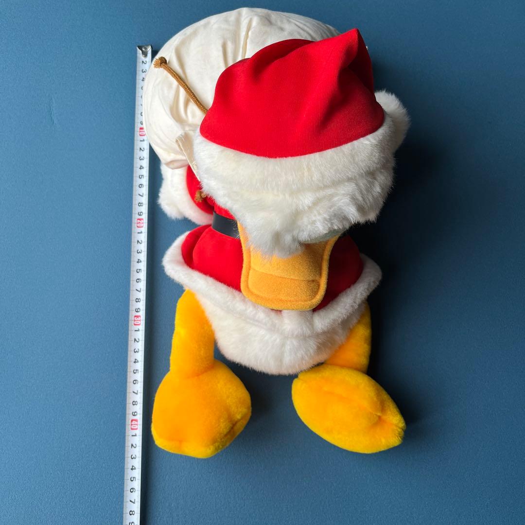 ディズニードナルドダックぬいぐるみ（サンタコスチューム） - メルカリ
