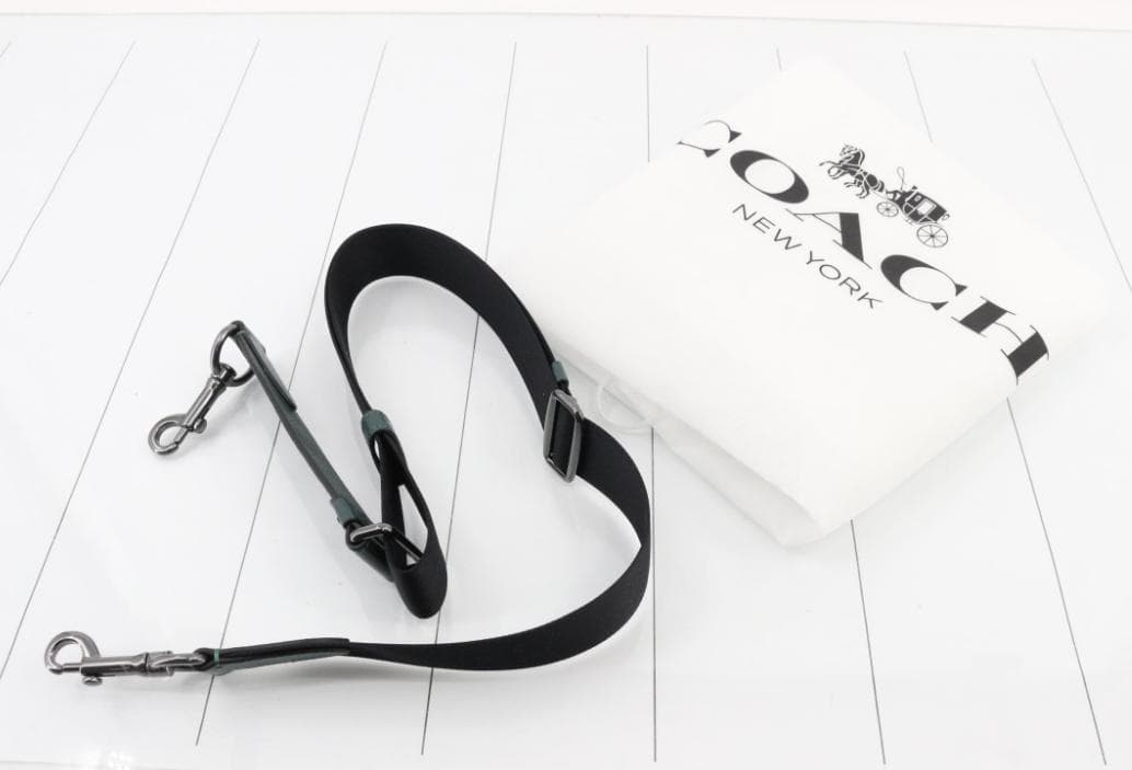 COACH 新品 ダークグリーン レザービジネスバッグ - メルカリ