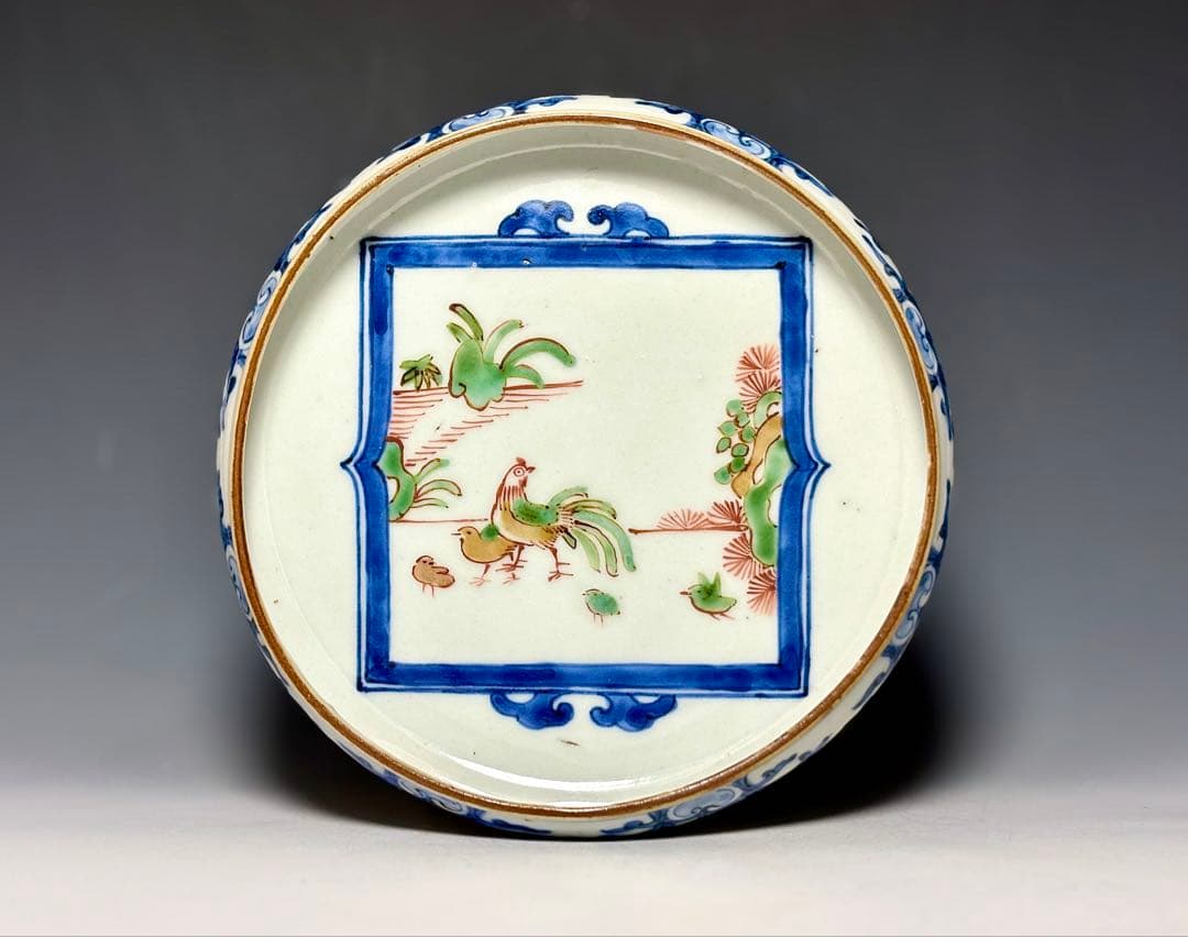 柿右衛門」団龍唐花文独楽形皿