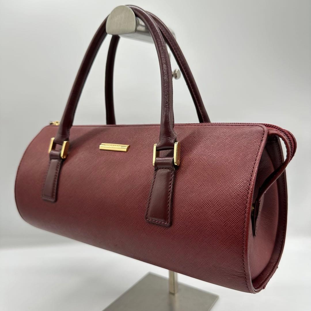 美品】バーバリー ハンドバッグ レザー ノバチェック 筒型 ロゴ