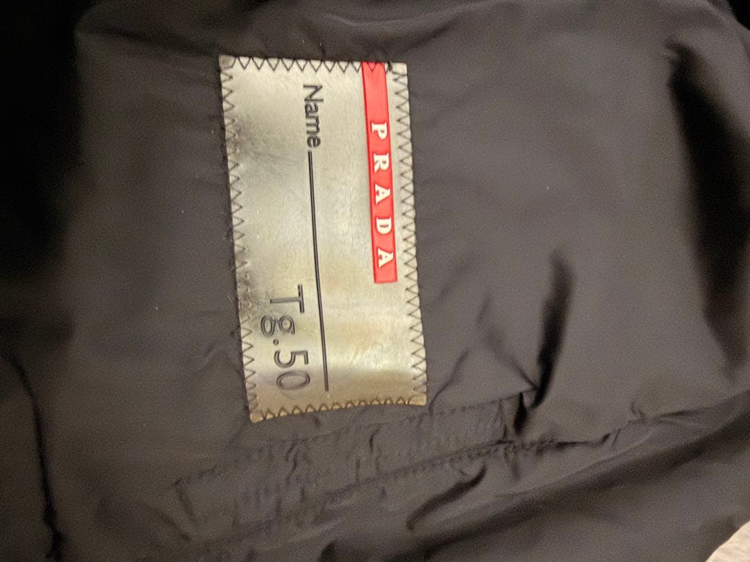 PRADA プラダ SGV294 パデットコート リネアロッサ 黒 50 - メルカリ