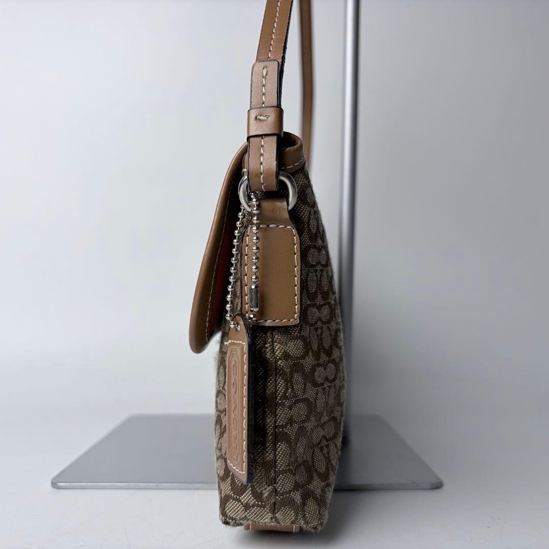 Coach Mini Signature Demi Clip pouch - メルカリ