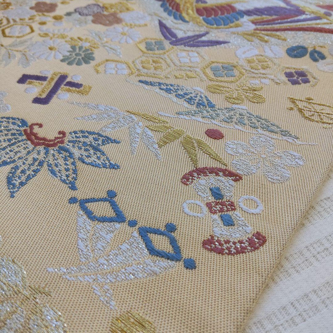 袋帯】幸せを結ぶ帯＊鳳凰と宝尽くしが織りなす西陣の華やぎ 生成り色