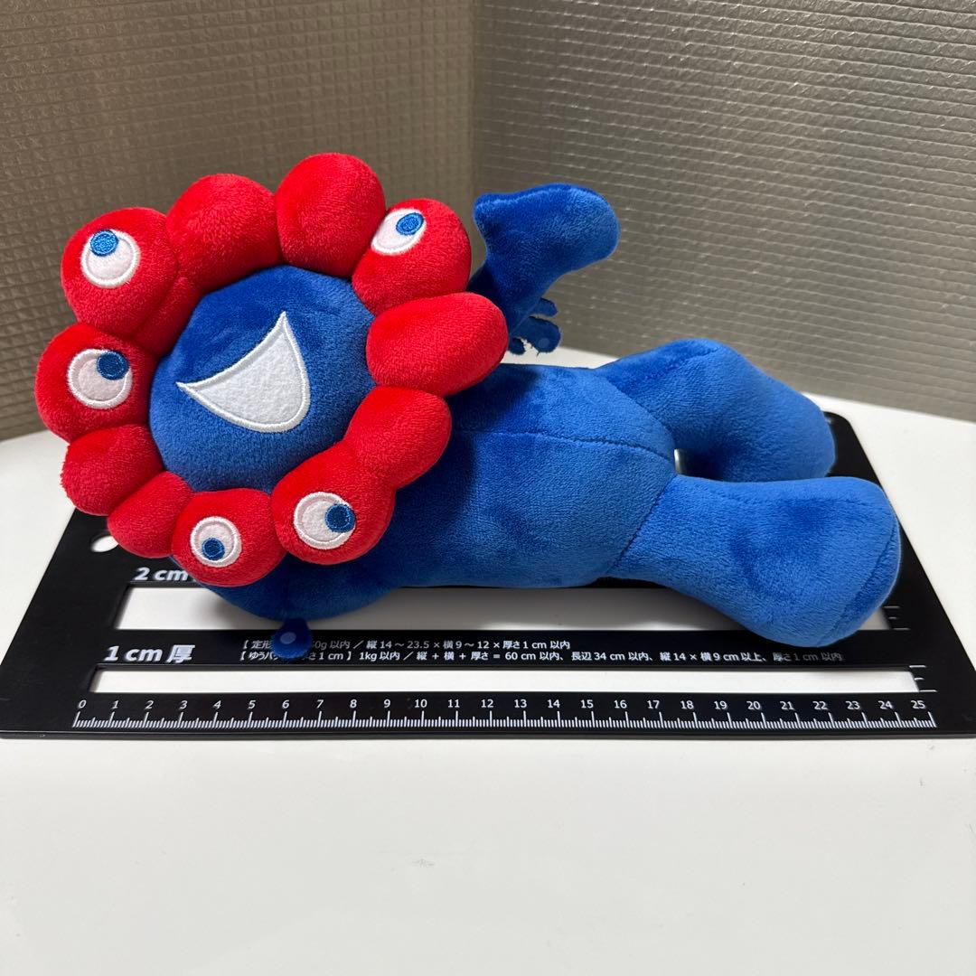 大阪万博 ミャクミャク寝そべりぬいぐるみ - メルカリ