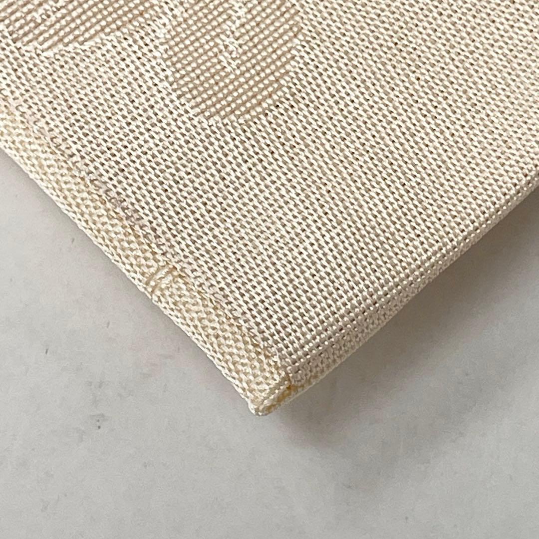 未使用［ 名古屋帯/ポリエステル ］東レシルック 生成り 菊 霞 芝草