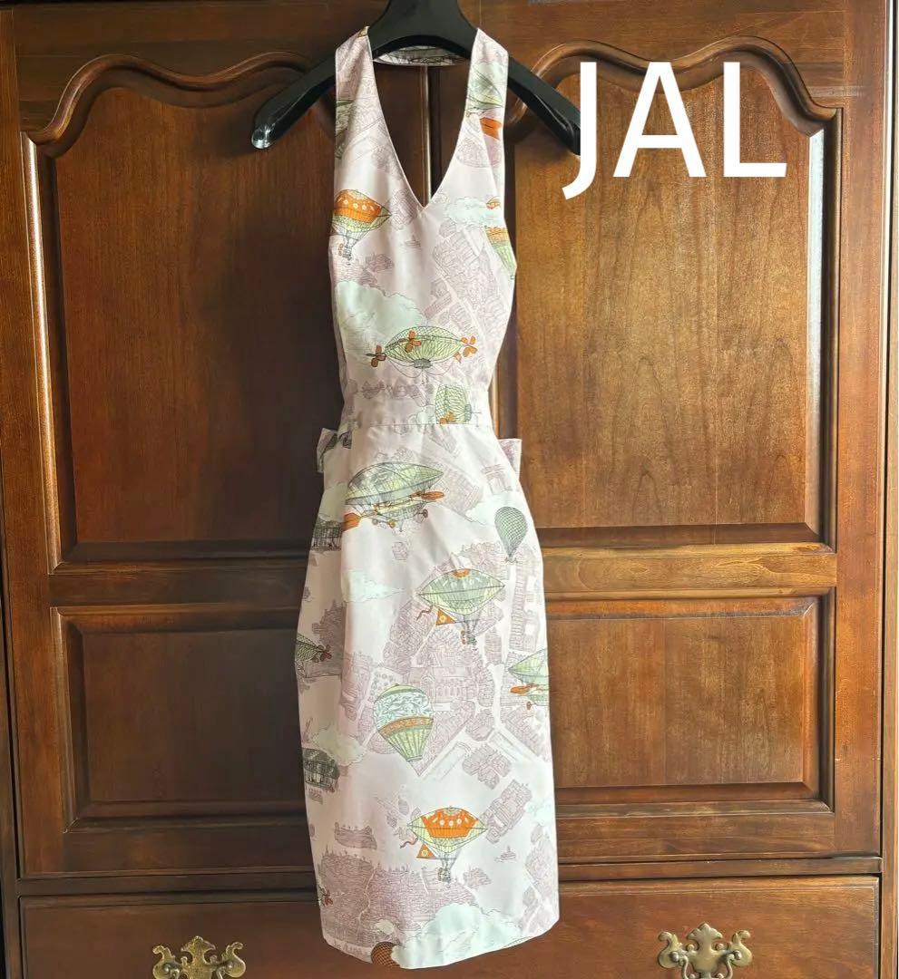 JAL 客室乗務員 CA エプロン ：yoshie inaba 飛行船柄 ピンク - メルカリ