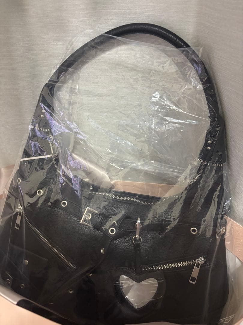 ダーリッチ スタッズレザーベルトデザインマキシバッグ - メルカリ