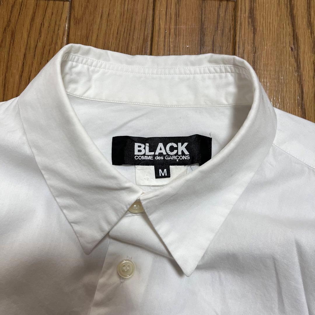 BLACK COMMEdesGARCONS コムデキャルソン ねじれシャツM - メルカリ