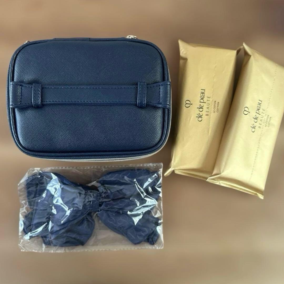 新品][未使用]クレドポーボーテ バニティ 化粧ポーチ リボン付き